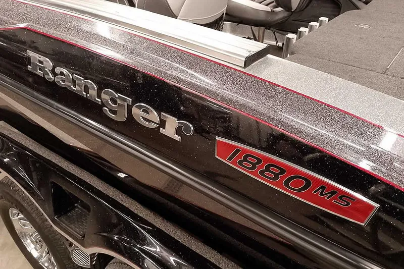 Slide: The Image of 2020 Ranger 1880MS Angler boat, black with red accents, close-up view. - 47