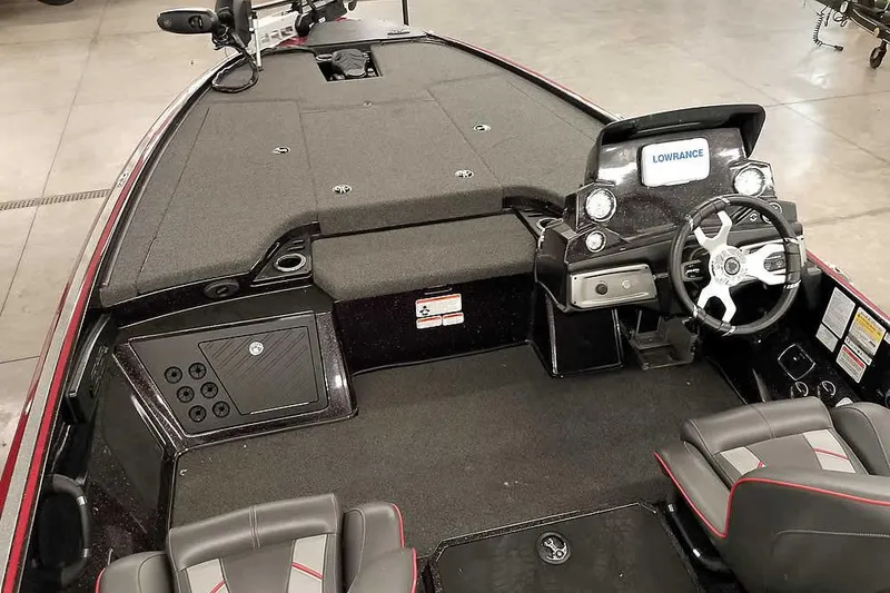 Slide: The Image of 2022 Nitro Z19 SC boat interior with steering console and seating. - 18