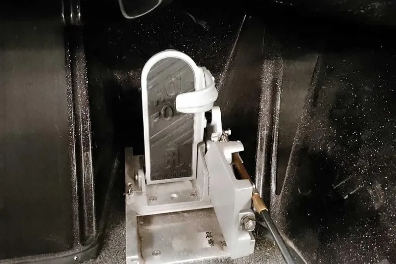 Slide: The Image of Foot pedal mechanism in a 2022 Nitro Z19 SC boat, showcasing detailed engineering. - 30