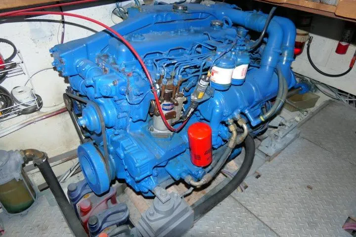 Slide: The Image of Blue marine engine in a 1983 CHB 45 boat, detailed view of components. - 64