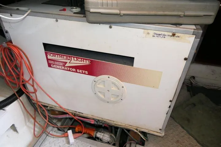 Slide: The Image of Northern Lights generator set on CHB 45, 1983 model, with visible cables and equipment. - 73