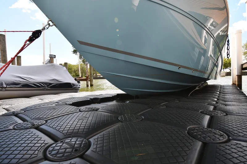 Slide: The Image of 2022 Sea Fox 268 Commander boat docked on a floating platform. - 2