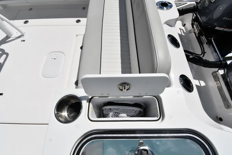 Slide: The Image of 2022 Sea Fox 268 Commander boat interior with seating and storage compartments. - 25