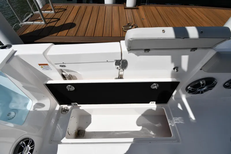 Slide: The Image of 2022 Sea Fox 268 Commander boat interior with storage compartment and seating. - 28