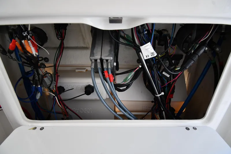 Slide: The Image of Electrical wiring inside a 2022 Sea Fox 268 Commander boat compartment. - 46