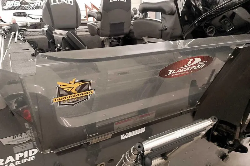 Slide: The Image of 2016 Lund 2075 Pro Guide boat interior with Humminbird and Blackfish decals. - 17
