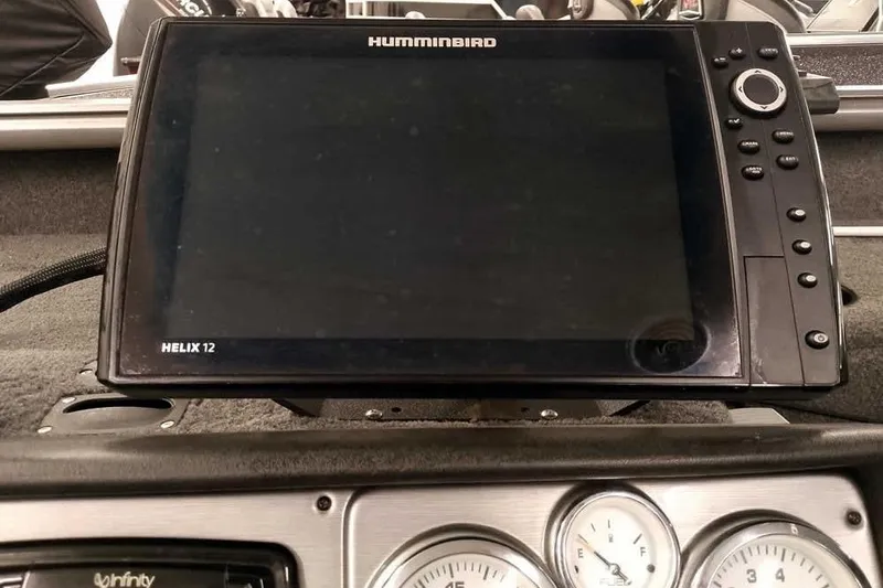 Slide: The Image of 2016 Lund 2075 Pro Guide boat dashboard with Humminbird Helix 12 fish finder. - 36