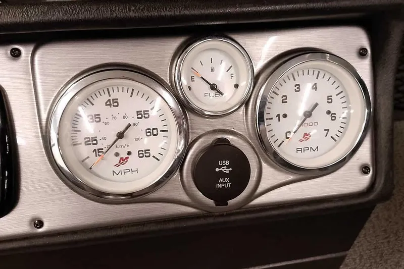 Slide: The Image of Dashboard of 2016 Lund 2075 Pro Guide with speedometer, fuel gauge, and RPM meter. - 38