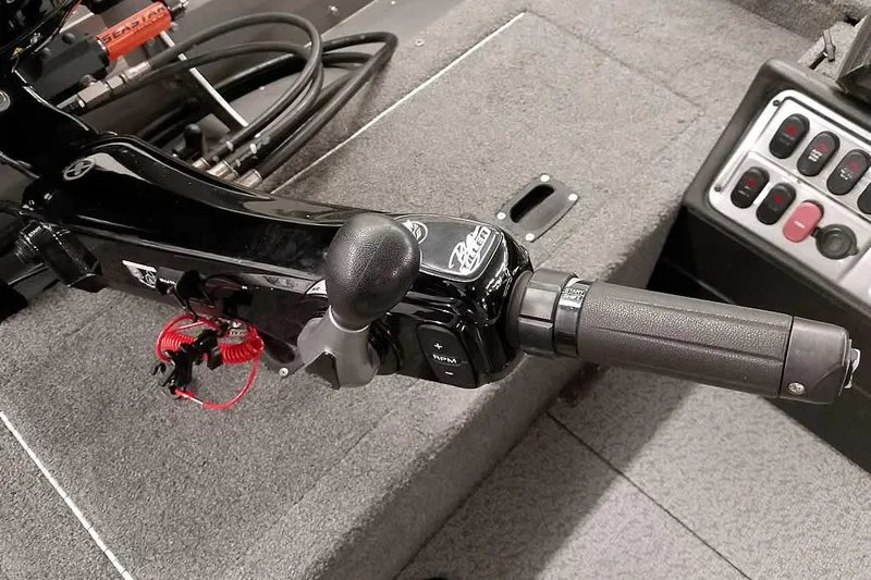 Slide: The Image of Close-up of 2016 Lund 2075 Pro Guide boat throttle and control panel. - 39