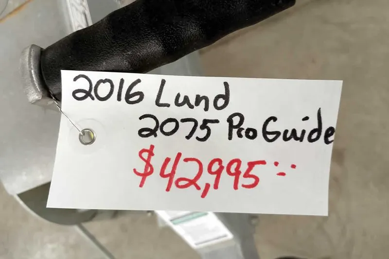 Slide: The Image of Price tag for 2016 Lund 2075 Pro Guide boat, listed at $42,995. - 4