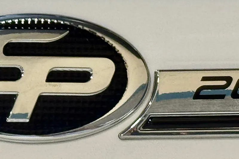 Slide: The Image of Sea Pro 2026 202 Center Console logo, sleek chrome design on white background. - 13