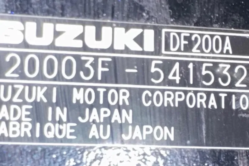 Slide: The Image of Suzuki DF200A engine plate on 2026 Sea Pro 202 Center Console boat. - 24