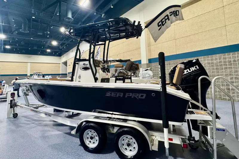 Slide: The Image of 2026 Sea Pro 202 Center Console boat on display with Suzuki engine. - 3