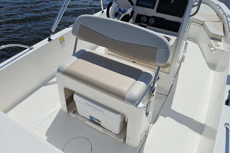 Slide: The Image of 2018 Boston Whaler 210 Dauntless boat interior with helm seat and console. - 27