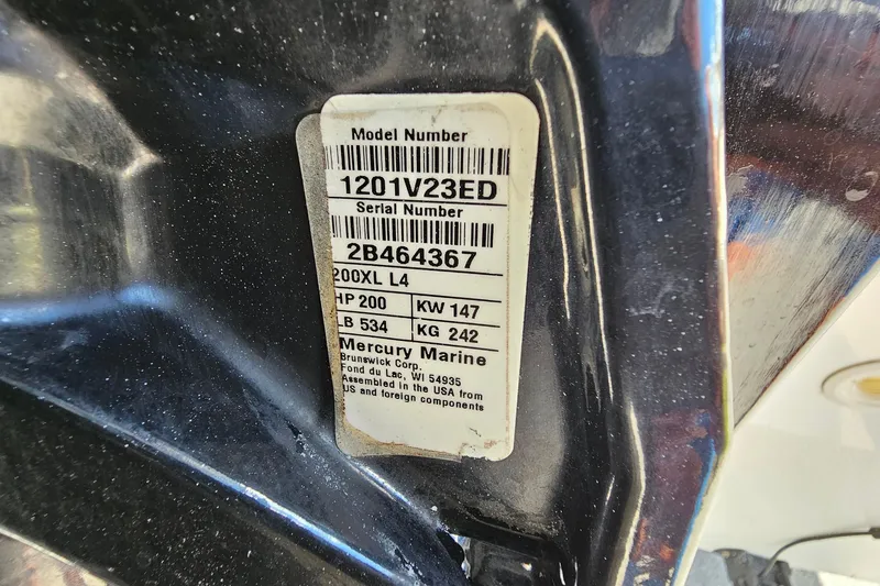 Slide: The Image of Label on 2018 Boston Whaler 210 Dauntless, featuring Mercury Marine engine details. - 9