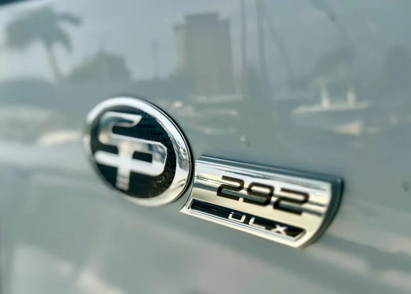 Slide: The Image of 2026 Sea Pro 292 DLX emblem on a sleek boat surface. - 13