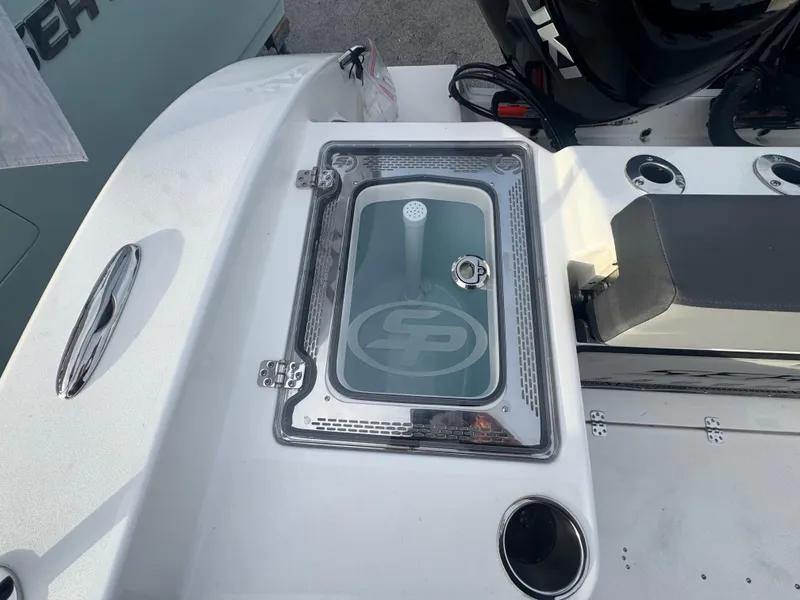 Slide: The Image of 2026 Sea Pro 292 DLX boat with livewell and seating area. - 14