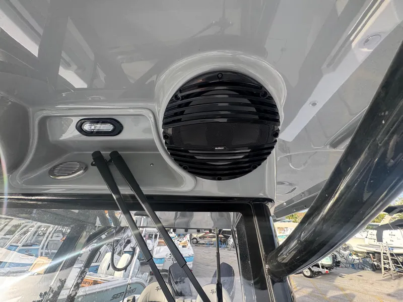 Slide: The Image of 2026 Sea Pro 292 DLX boat interior with speaker and light fixtures. - 27