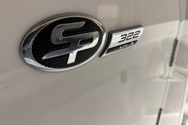 Slide: The Image of 2026 Sea Pro 332 DLX emblem on a sleek white surface. - 1