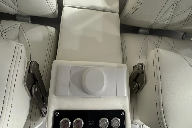 Slide: The Image of Luxurious white leather seating in 2026 Sea Pro 332 DLX boat interior. - 32