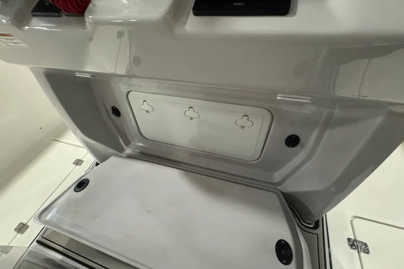 Slide: The Image of 2026 Sea Pro 332 DLX boat interior storage compartment with sleek design. - 37