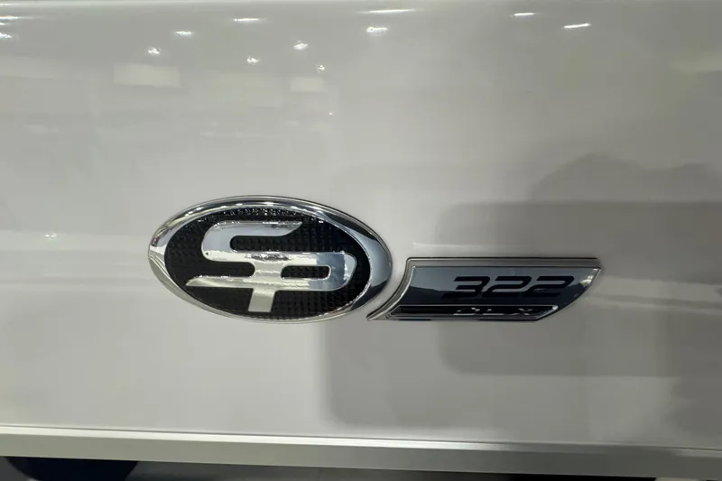 Slide: The Image of 2026 Sea Pro 332 DLX logo on a sleek white surface. - 50