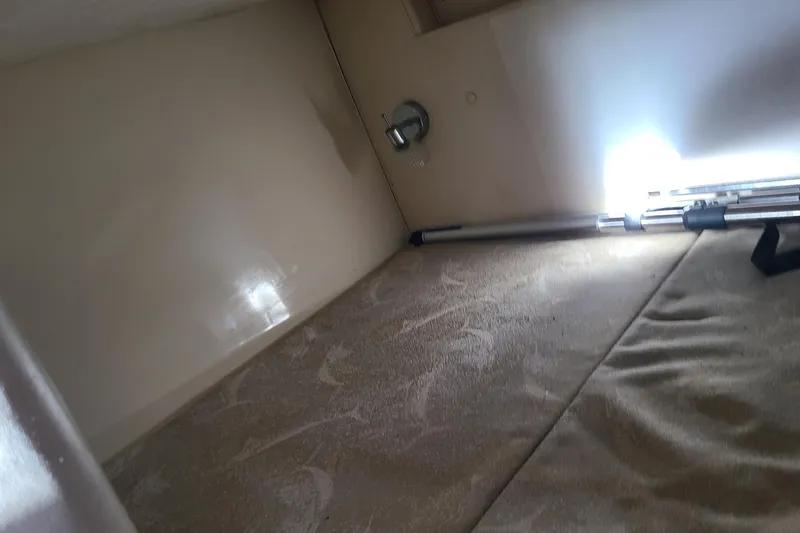 Slide: The Image of Interior cabin view of a 2005 Aquasport 275 Explorer boat. - 9