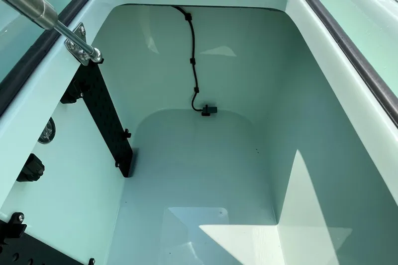 Slide: The Image of 2026 Chittum Skiffs Islamorada 18 boat interior showing plumbing and mechanical components. - 26