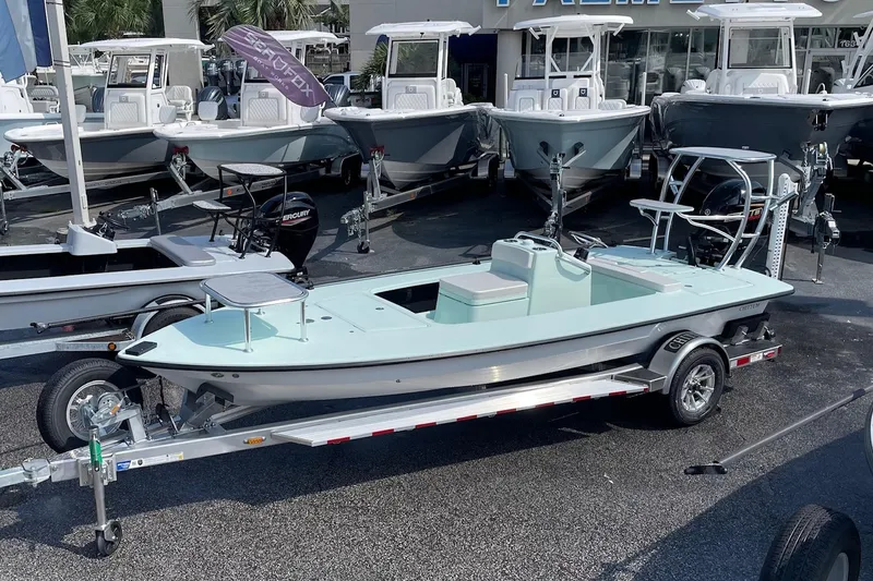 Slide: The Image of 2026 Chittum Skiffs Islamorada 18 boat on trailer at dealership. - 3
