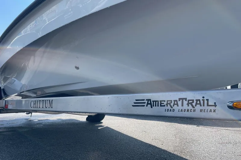 Slide: The Image of Label on Chittum Skiffs Islamorada 18 trailer, detailing tire and loading information. - 35