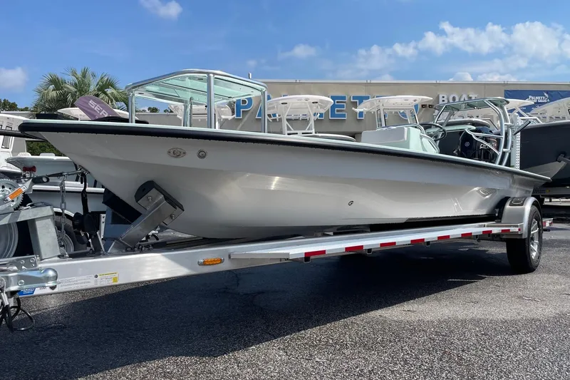 Slide: The Image of 2026 Chittum Skiffs Islamorada 18 on trailer at Palmetto Boat dealership. - 5