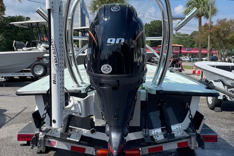 Slide: The Image of 2026 Chittum Skiffs Islamorada 18 boat, sleek design, parked on trailer. - 7