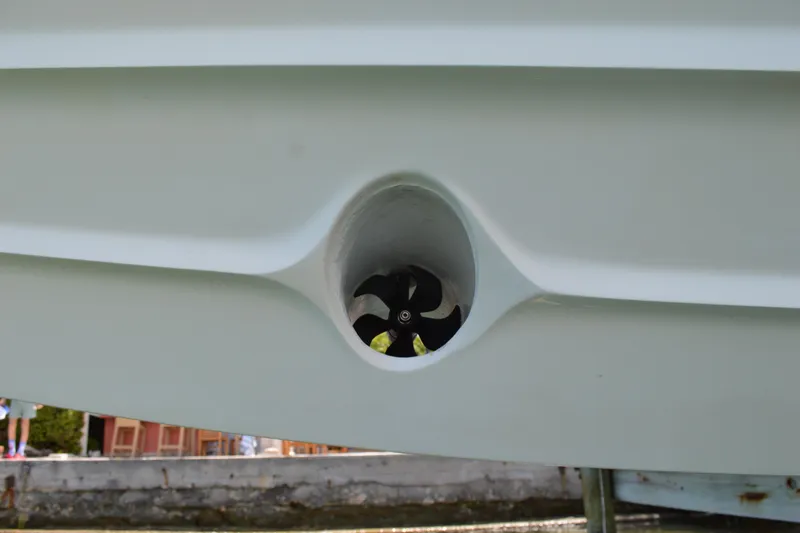 Slide: The Image of Close-up of 2015 Axopar T-Top boat's bow thruster detail. - 11