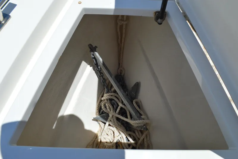 Slide: The Image of Anchor and rope storage in 2015 Axopar T-Top boat compartment. - 18