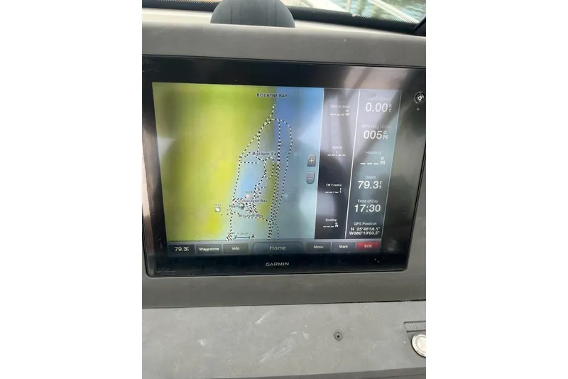 Slide: The Image of Garmin navigation display on 2015 Axopar T-Top boat, showing Biscayne Bay map and data. - 28