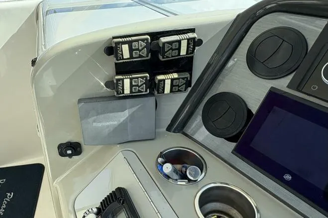Slide: The Image of Control panel of a 2006 Sea Ray 40 Motor Yacht with navigation equipment. - 23