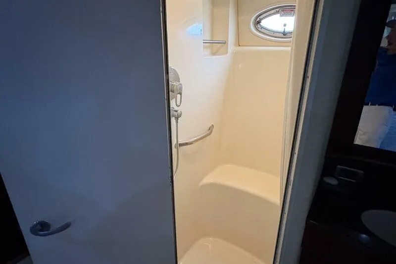 Slide: The Image of Shower area in 2006 Sea Ray 40 Motor Yacht with porthole window. - 38