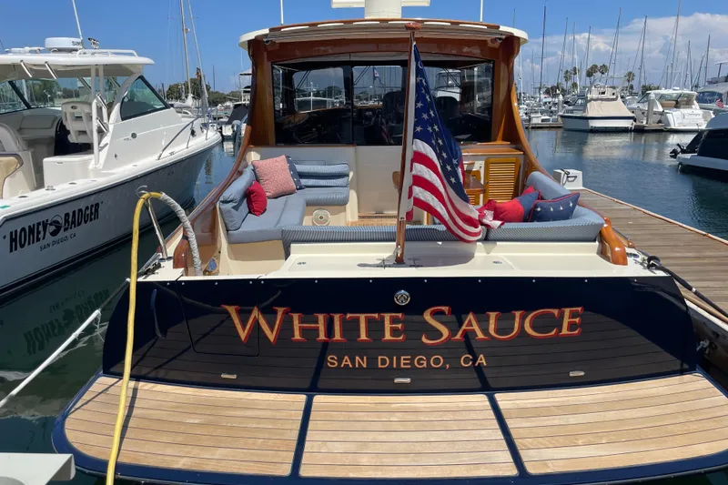 Slide: The Image of 2017 Hinckley Talaria 43 Motoryacht "White Sauce" docked in San Diego marina. - 1