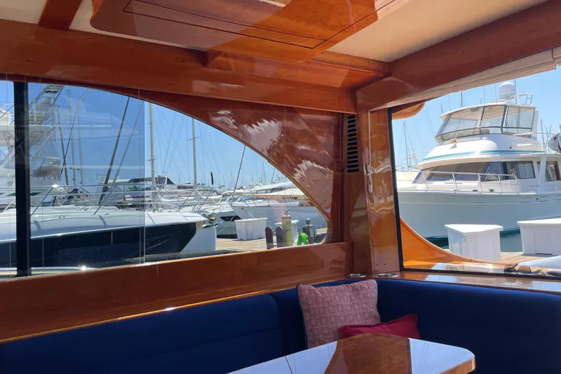 Slide: The Image of Interior view of 2017 Hinckley Talaria 43 Motoryacht with marina backdrop. - 10