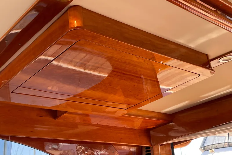 Slide: The Image of Polished wood interior of 2017 Hinckley Talaria 43 Motoryacht ceiling detail. - 12