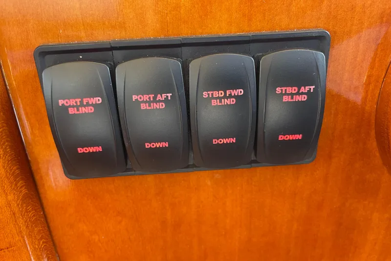 Slide: The Image of Control panel for blinds on a 2017 Hinckley Talaria 43 Motoryacht. - 17