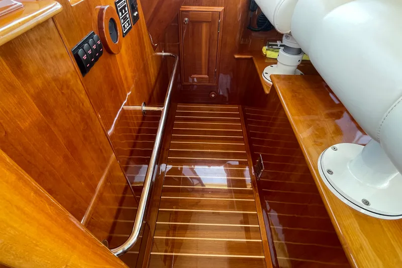 Slide: The Image of Luxurious interior of 2017 Hinckley Talaria 43 Motoryacht with polished wood finish. - 20