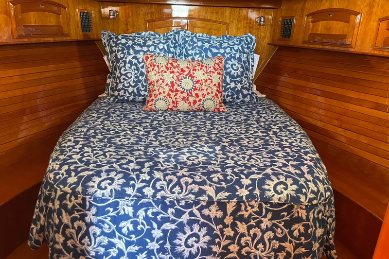 Slide: The Image of Luxurious cabin interior of 2017 Hinckley Talaria 43 Motoryacht with elegant bedding. - 31