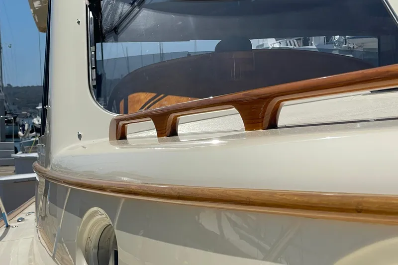 Slide: The Image of 2017 Hinckley Talaria 43 Motoryacht, showcasing elegant wood detailing and sleek design. - 44