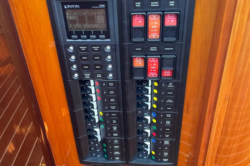 Slide: The Image of Control panel of a 2017 Hinckley Talaria 43 Motoryacht with switches and indicators. - 50
