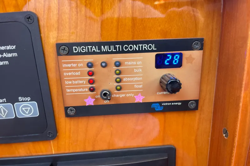 Slide: The Image of Digital multi control panel on 2017 Hinckley Talaria 43 Motoryacht, featuring Victron Energy system. - 51