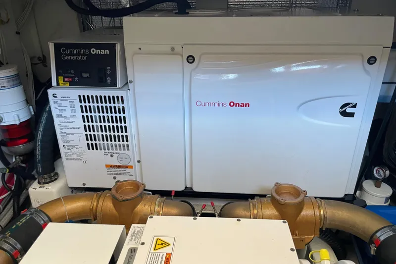 Slide: The Image of Cummins Onan generator in 2017 Hinckley Talaria 43 Motoryacht engine room. - 53