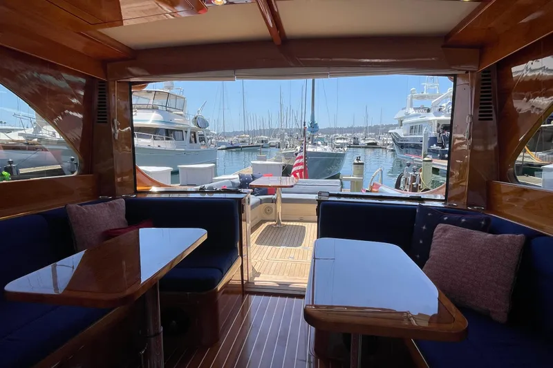 Slide: The Image of Luxurious interior of 2017 Hinckley Talaria 43 Motoryacht docked at marina. - 6