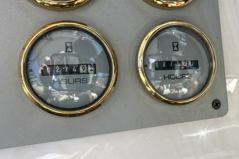Slide: The Image of Hour meters on a 2012 Bluewater 5200 boat, showing 2749 and 2752 hours. - 15