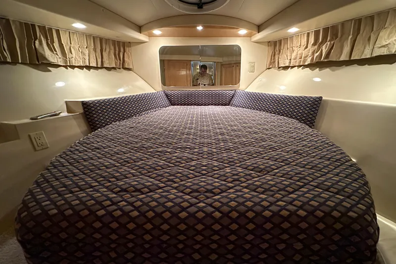 Slide: The Image of Luxurious bedroom interior of 2012 Bluewater 5200 Custom Series Yacht with plush bedding. - 36